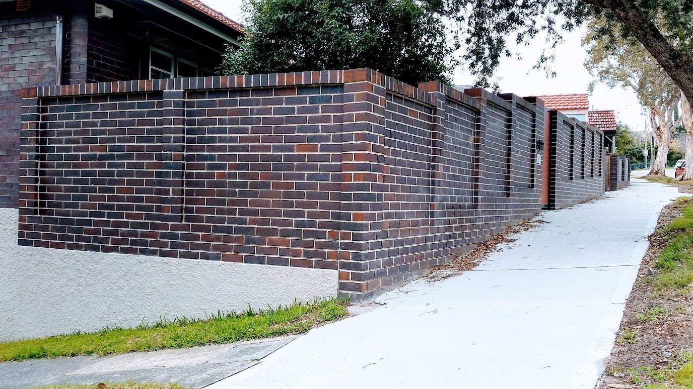 Brick fence and retaining wall — Fairlight