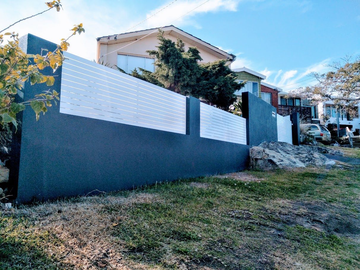 Brick fence with aluminium slat infill in Dee Why, Sydney